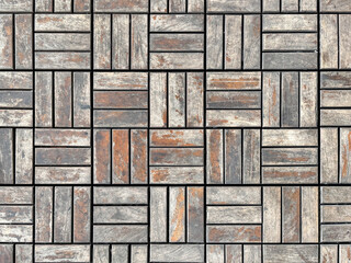 Seamless natural grey rustic wood decking texture in checkerboard square and stripes pattern, in many variations with interlocking system. Square and striped solid wooden tiles decking system with bla