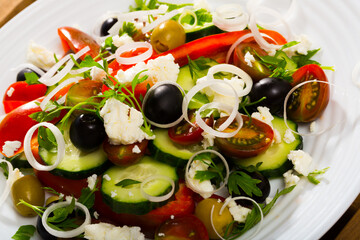 Shopska salad is tasty dish of Bulgarian cuisine in restaurant.