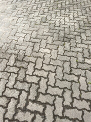 The floor is made of tiles and has a checkered pattern