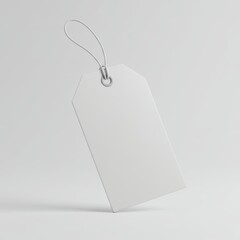 Blank white price tag with white string on a white background