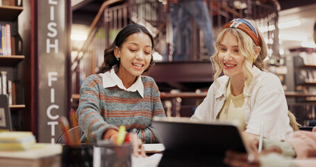 Students, women and happy with discussion at library for group project, research or education at university. People, girl and review with problem solving, notes or learning for scholarship at college