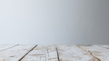Wooden Table in Soft Light: A rustic wooden table against a simple, softly lit backdrop creates an inviting and adaptable setting. This image evokes warmth and is perfect for product display.