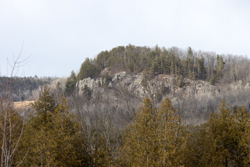 A rocky bluff in the countryside