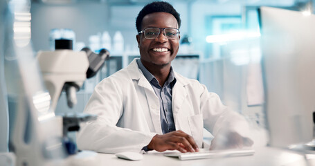Computer, black man and portrait of scientist typing in laboratory for medical research or...