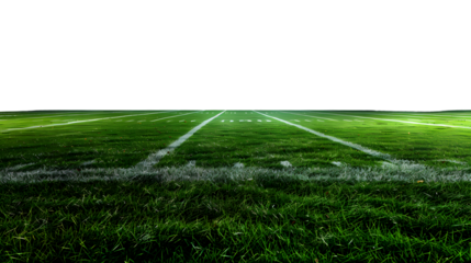 Nighttime College Football Game on Illuminated Grass Field with Spotlights