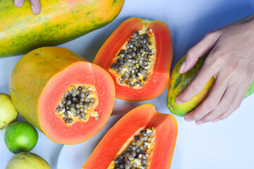 Papaya fruit (Carica papaya) in isolated white background, (papaya on white background)