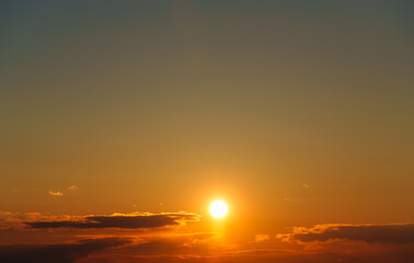 beautiful and dramatic sunset sky with bright yellow clouds as abstract background