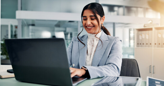 Happy woman, laptop and typing in office for business, company report and financial review. Accountant, computer and editing in firm for email draft, loan application and pleased with agency survey