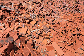 Many broken bricks on a pile of rubble
