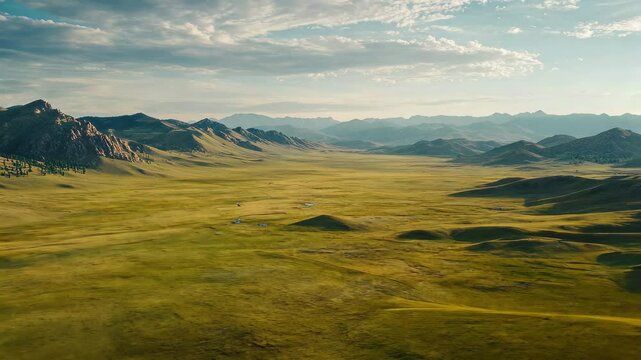 Breathtaking aerial view of Ork mountain landscape showcasing serene steppe and distant mountain ranges, Aerial view of steppe and mountains landscape in Orkhon valley, Mongolia,