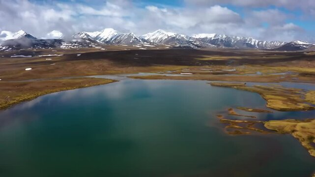 Drone footage shows the stunning Arabel Plateau in the Issyk-Kul region of Kyrgyzstan, capturing the vast alpine landscape and rugged terrain.