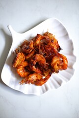 Top view of grilled prawns in a plate