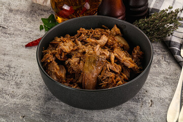 Shredded slow cooked pork meat