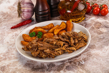 Baked shredded pork with potato