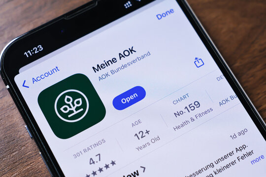 Poznan, Poland - March 26, 2025: Smartphone screen showing Meine AOK health insurance app page on App Store with green logo