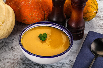 Vegan pumpkin cream soup served sesam
