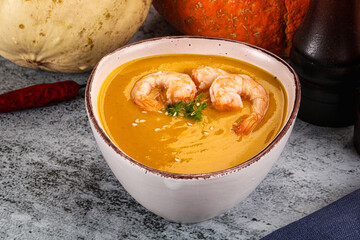 Pumpkin cream soup with prawns