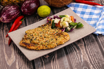 Tasty chicken steak with vegetables