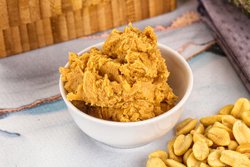 Crunchy peanut butter fat product