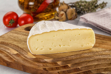 Soft brie cheese with mold