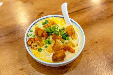Taiwanese savory soy milk with fried crullers and egg, served at Yonghe Doujiang, highlighting a beloved local breakfast tradition