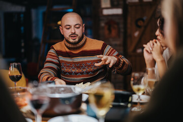A group of friends enjoying a casual dinner together at a cozy bar. Their cheerful expressions and warm atmosphere create a sense of togetherness and social connection.