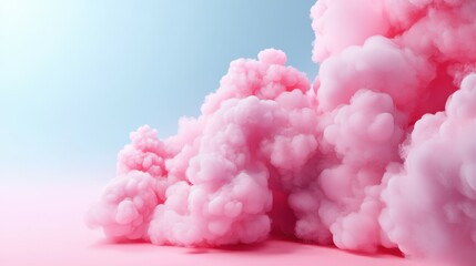 Fototapeta premium Fluffy pink clouds create a dreamy atmosphere on a soft background.