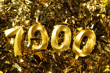 7k followers thank you on golden tinsel background. 7000 network friends, subscriber, followers and likes