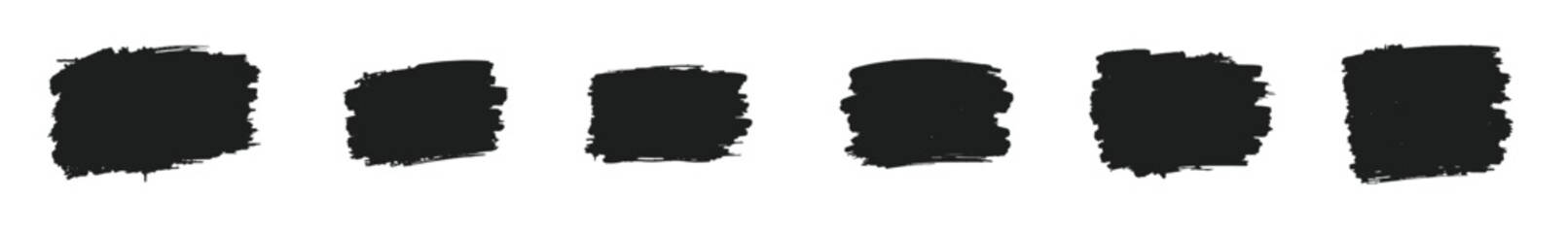 Black distressed grunge brush strokes set on a white background