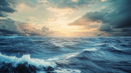 Dramatic stormy seascape with sunset through clouds