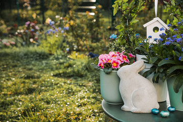 Easter decor with spring flowers and easter bunny