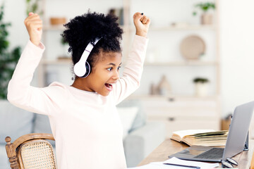 Schoolgirl Getting A-Grade Sitting At Laptop Celebrating Success Learning At Home. School Tests And Exams, Distant E-Learning