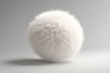 Soft and Fluffy White Ball of Fur on a Smooth Gray Background Ideal for Texture, Background, or Decorative Use in Various Creative Projects