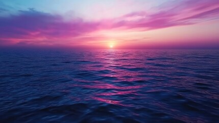 Fototapeta premium Sunset over Calm Ocean with Pink Clouds