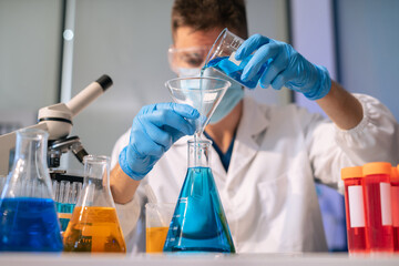 Glass vial, pipette and scientist in laboratory for medical study, research or experiment.