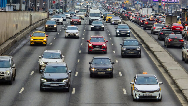 Moscow April 10 2025, A busy highway with many cars on it. The cars are of different colors and sizes. Scene is busy and hectic