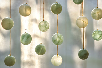 Sunlit Splendor: Jade Beads Casting Celestial Patterns