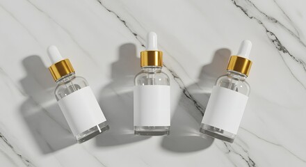 Two cosmetic dropper bottles with white and gold design on marble
