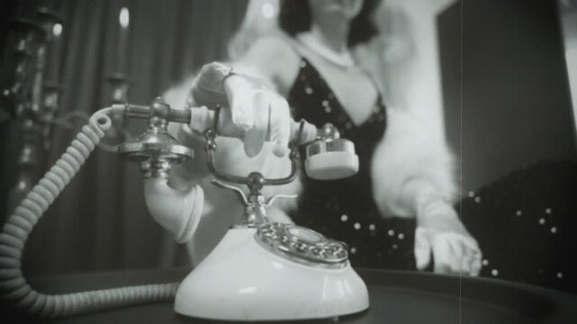 black and white film cinema Retro lady sexy woman call talk. hand picks up receiver of old style landline telephone. Girl using retro phone line. 20s 30s pin up old roar style. happy face beauty girl 