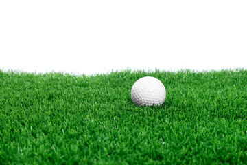 Golf ball on green grass against white background