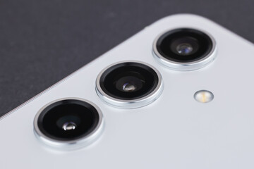 Smartphone cameras close-up. A universal set of cameras in a modern mobile phone.