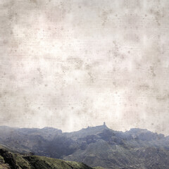 textured stylish old paper background, square, with landscape of central Gran Canaria