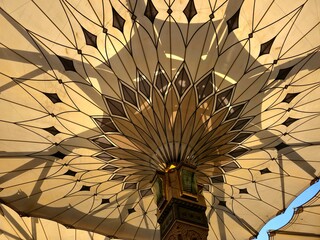 The tents at the prophet's mosque or Al Masjid Al Nabawi in Madinah at the outer courtyard to...