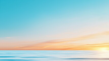 Obraz premium Vibrant sunset over calm ocean waters with a serene gradient sky.