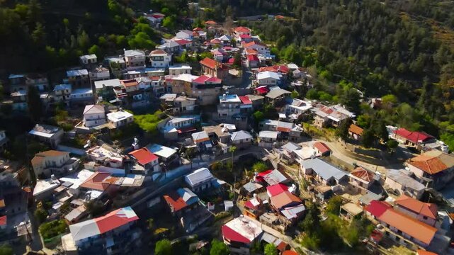 Cypriot mountain village near Nicosia.
View from above on the evening landscape. Countryside and measured life.