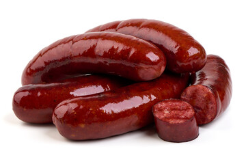 Roasted pork sausages, isolated on white background.