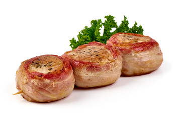 Bacon-wrapped pork medallions, isolated on white background.