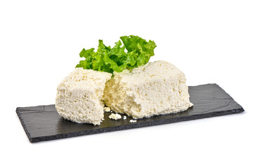 Homemade cottage cheese, isolated on white background.
