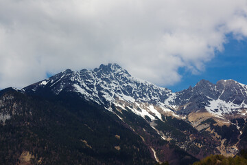 Dramatic peaks of the Nordkette tower over Innsbruck