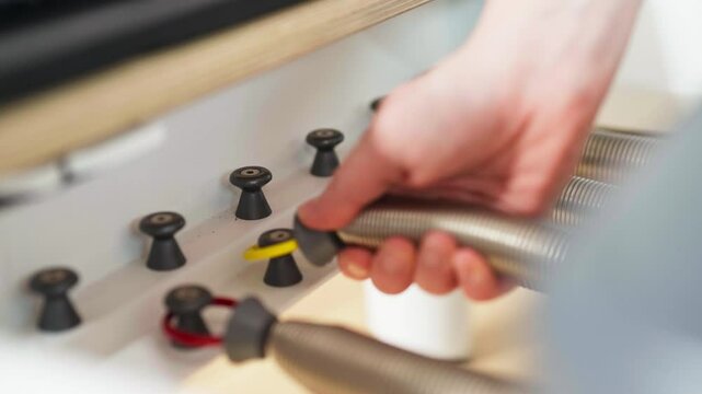 Adjusting springs with levels of resistance in pilates reformer machine